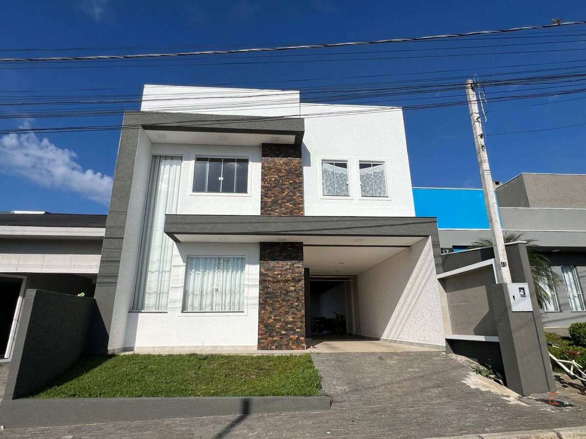 Sobrado 3 quartos (um suite) em condominio fechado na Fazenda Rio Grande